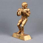 This is a image of a gold color quarterback throwing a football