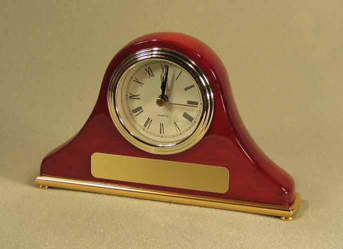 Image of a redwood desk clock with a gold color bezel