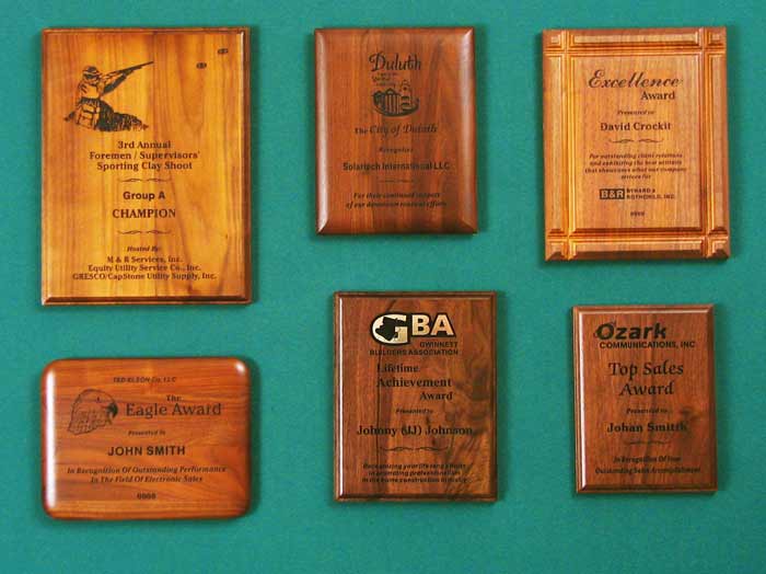 Image of six lasered walnut plaques
