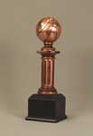 This is a image of a copper colored  metal clad resin of a baseball on a pedistal set on a black base