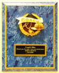 This is a image of a blue marble FB gold edge plaque with a colored coach releaf.
