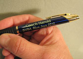 This is a image of a pen engraved for a coach.