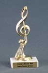 This is a image of a gold color modern music note set on a marble base